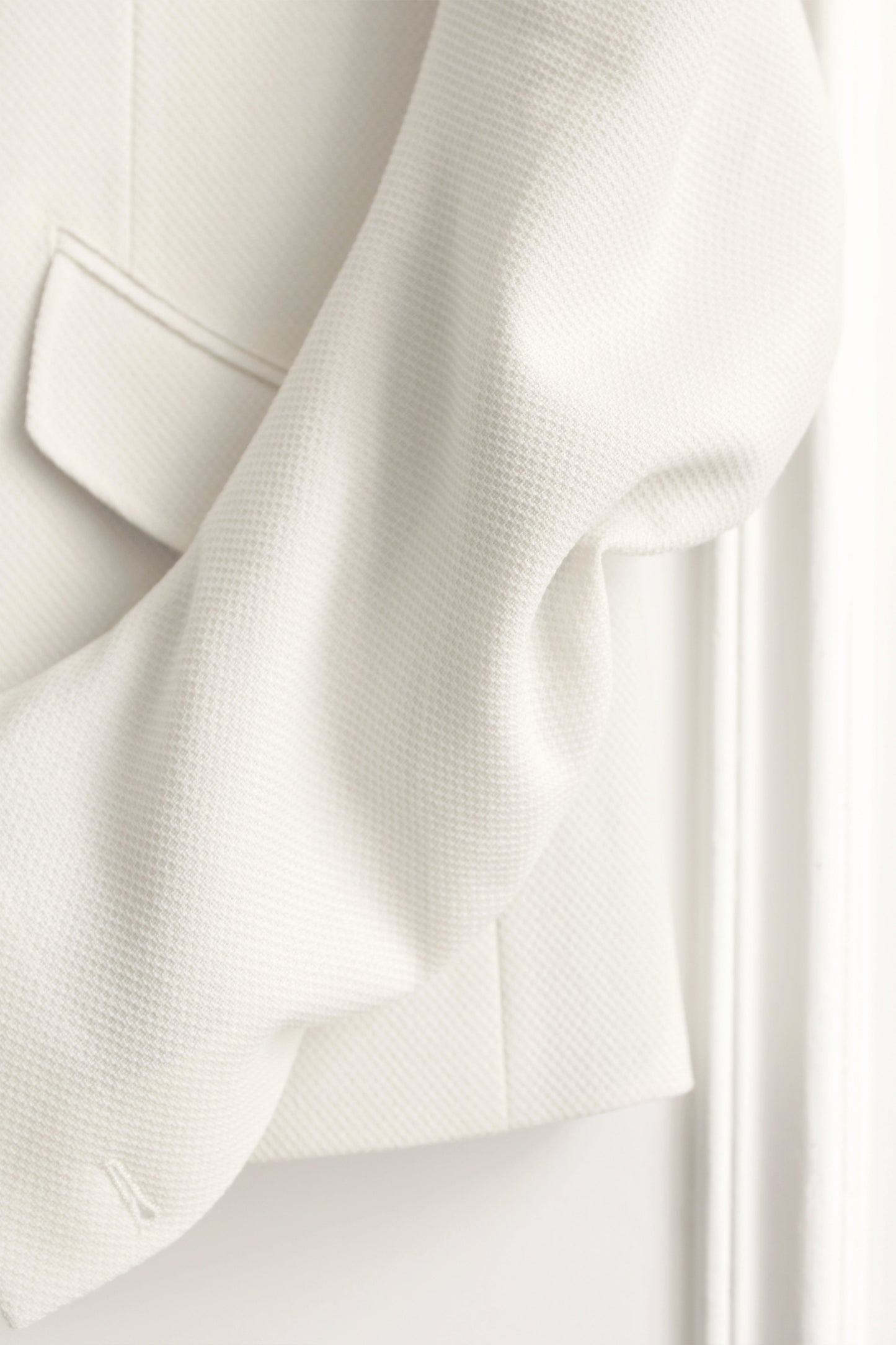 DRAPED BLAZER IN IVORY PIQUE WOOL