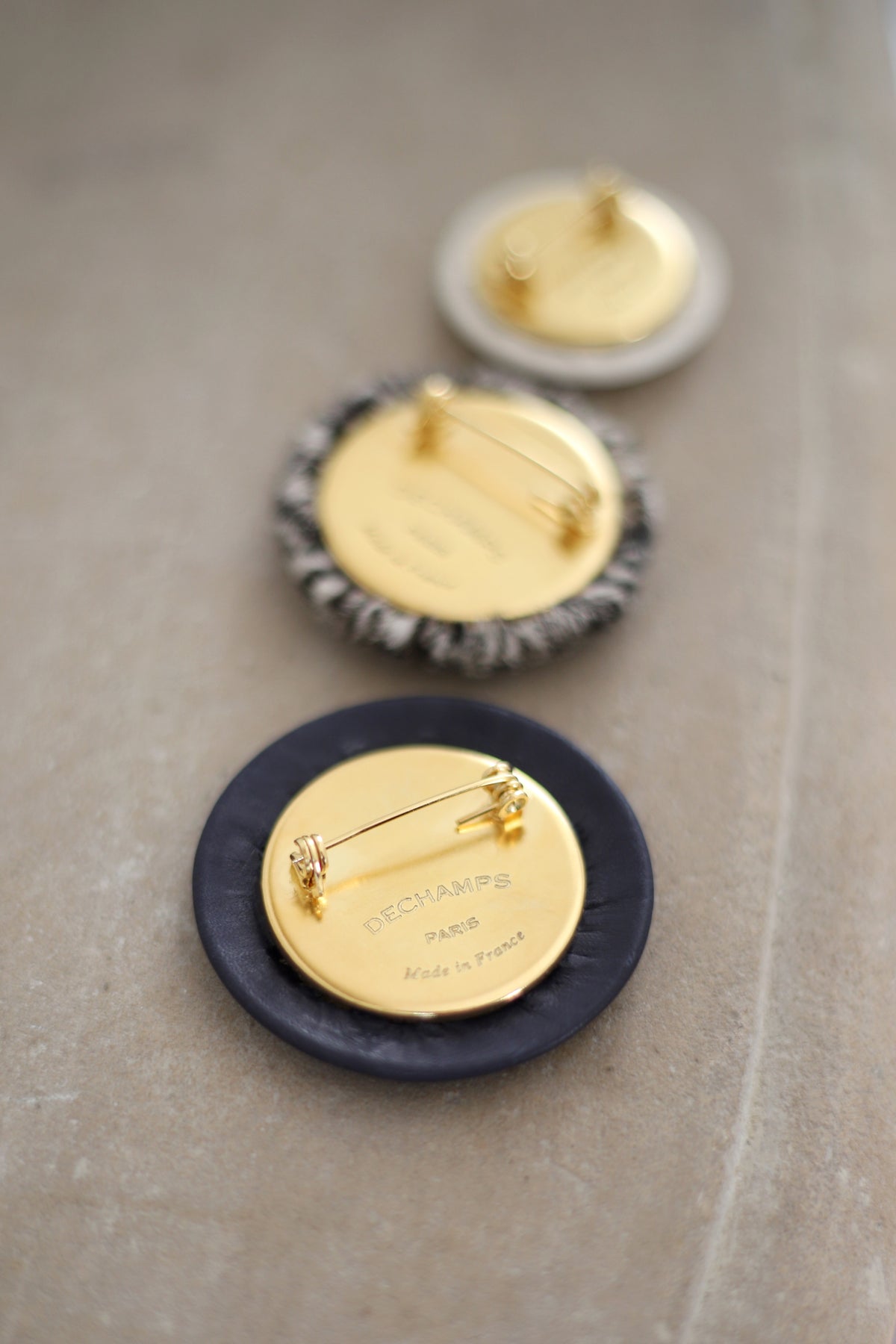 LEATHER PINBACK BUTTON L