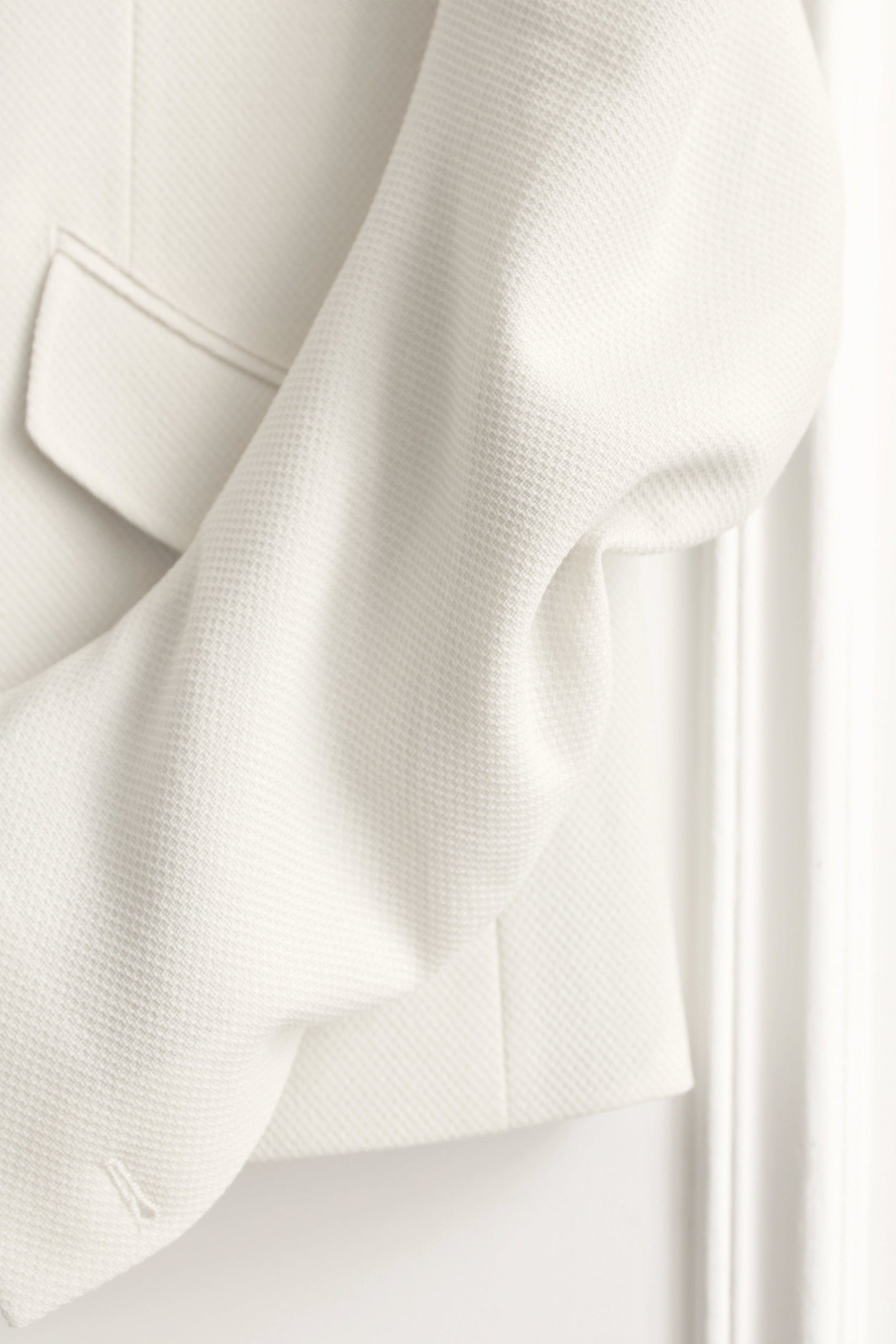 DRAPED BLAZER IN IVORY PIQUE WOOL
